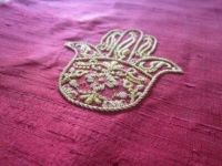 Hamsa symbole broderie or